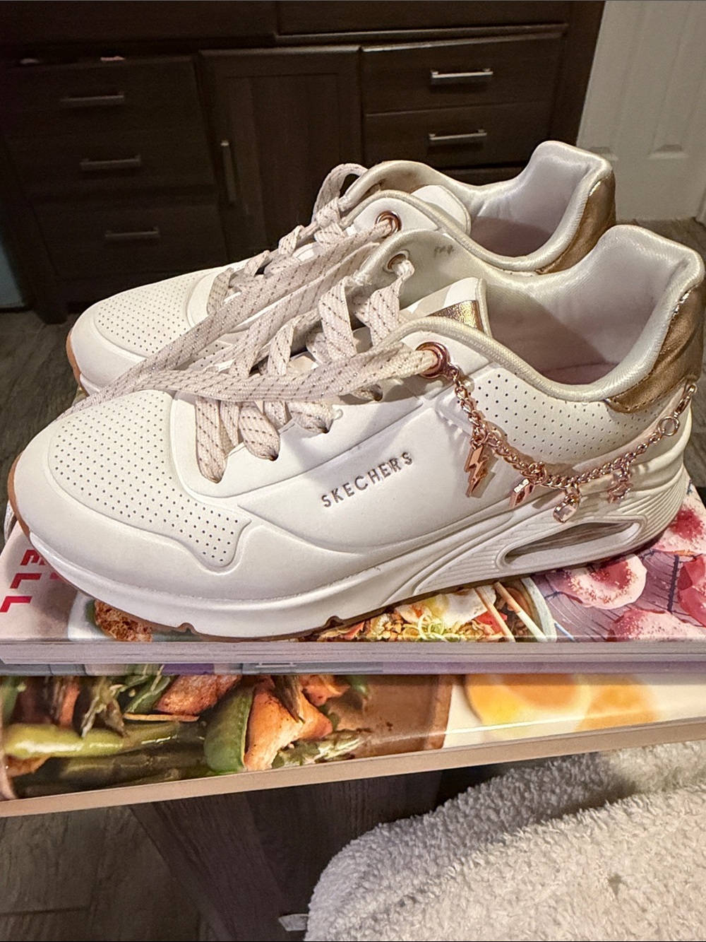 Girls Skechers White Sneakers with Rose Gold Accents and Charm